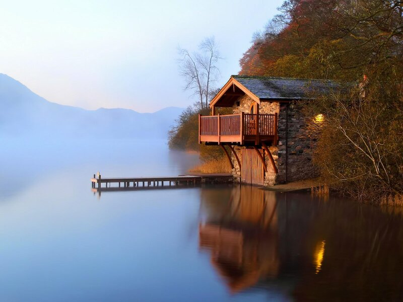 Cottage by the lake at dawn