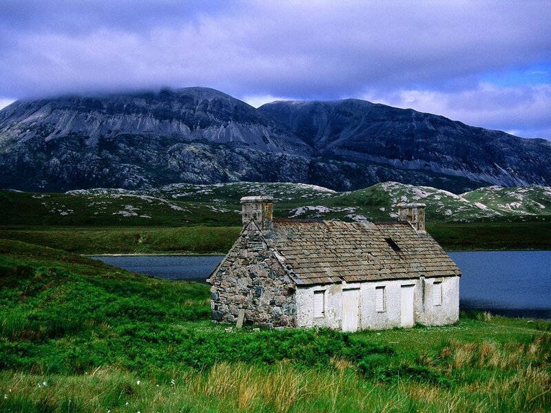 Cottage by the lake in Scotland