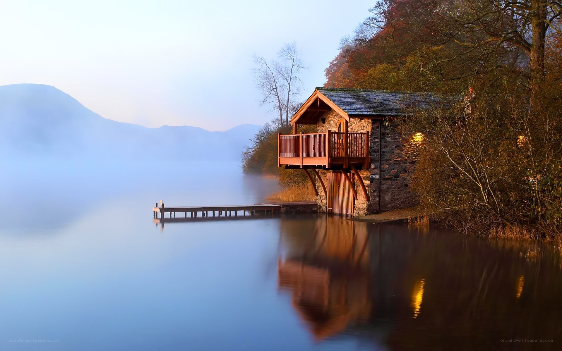 Cottage by the misty lake