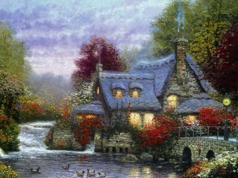 Cottage by the river at dusk