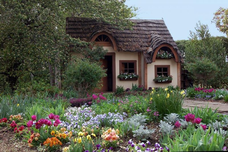 cottage in a flower garden