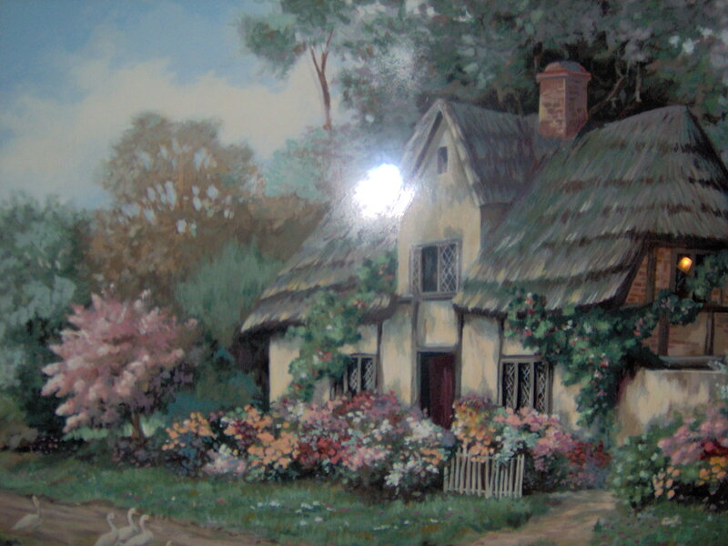 Cottage in a flower garden