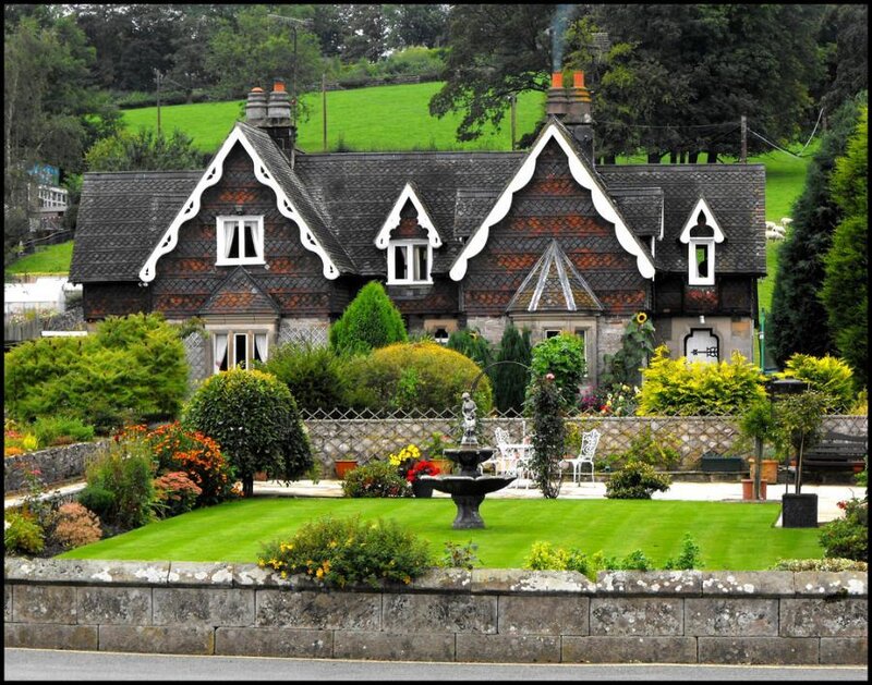 cottage with garden and fountain