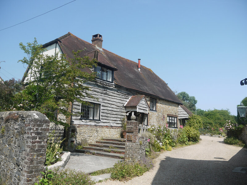 Cottage with Gravel Driveway
