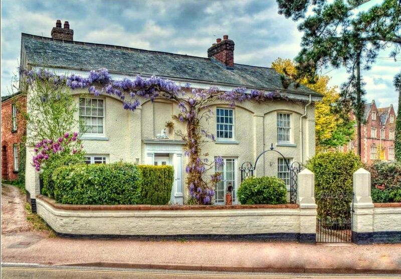 cottage with wisteria flowers