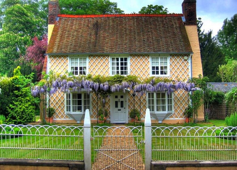 cottage with wisteria vines
