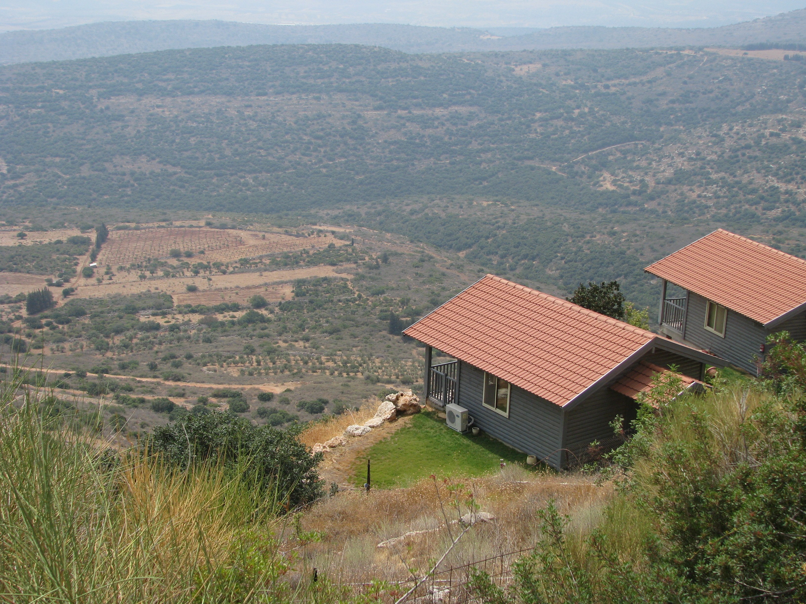 Cottages on a hillside overlooking a valley