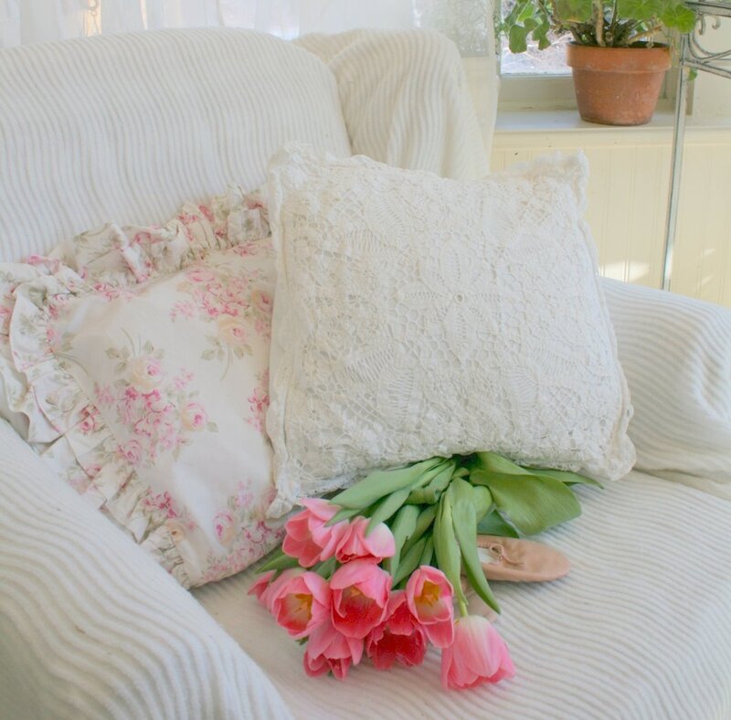 Couch with Pillows and Flowers
