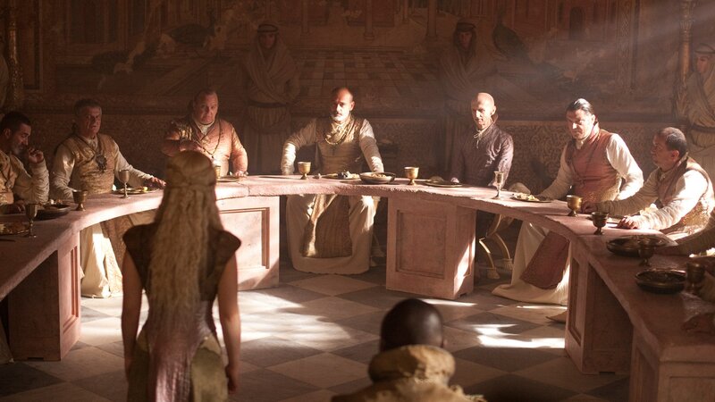 Council meeting in a grand hall