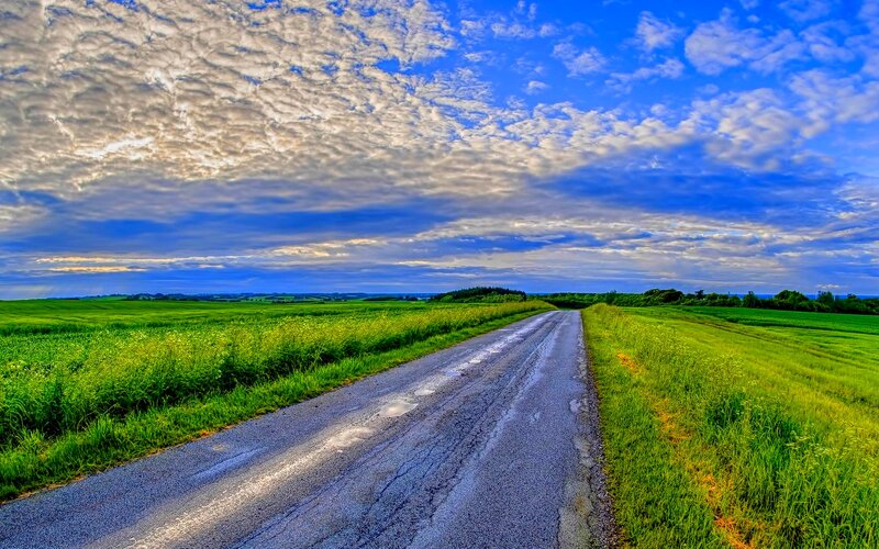 Country Road Through Fields — Green, Serene, Afternoon, Photograph, Clouds