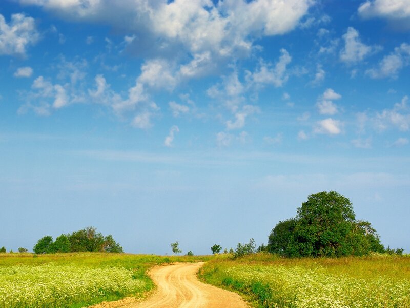 Country road under blue sky