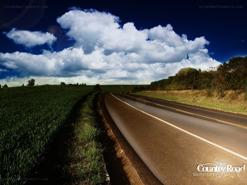Country road under cloudy sky