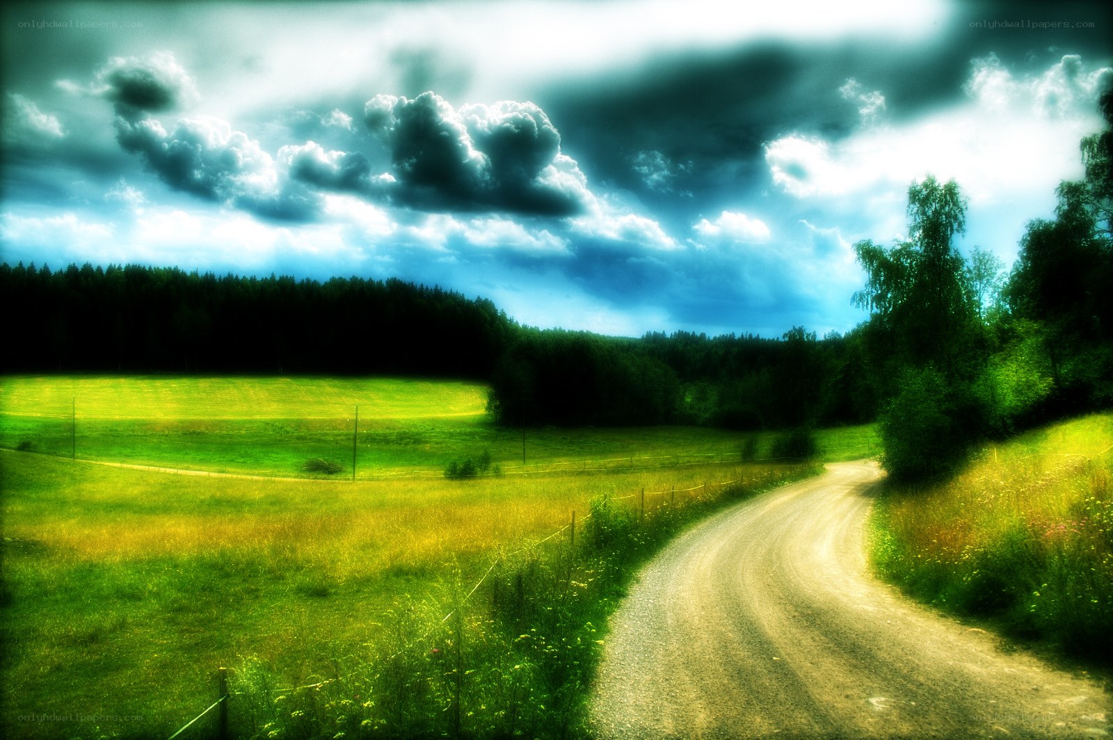 Country road under dramatic sky