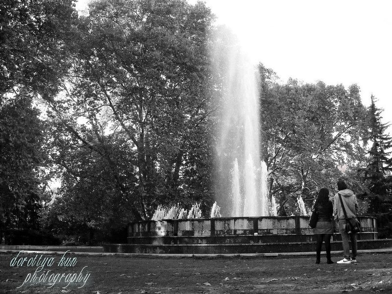 Couple at a fountain in the park
