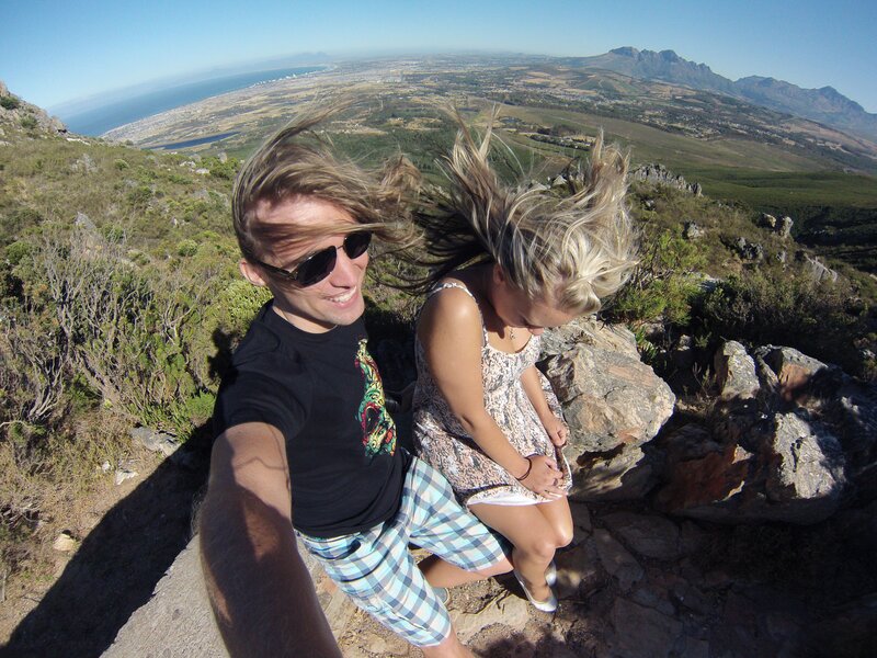 Couple at mountain viewpoint