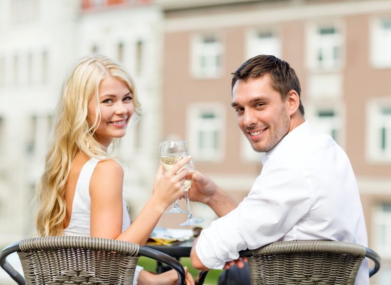 Couple at Outdoor Table — White, Relaxed