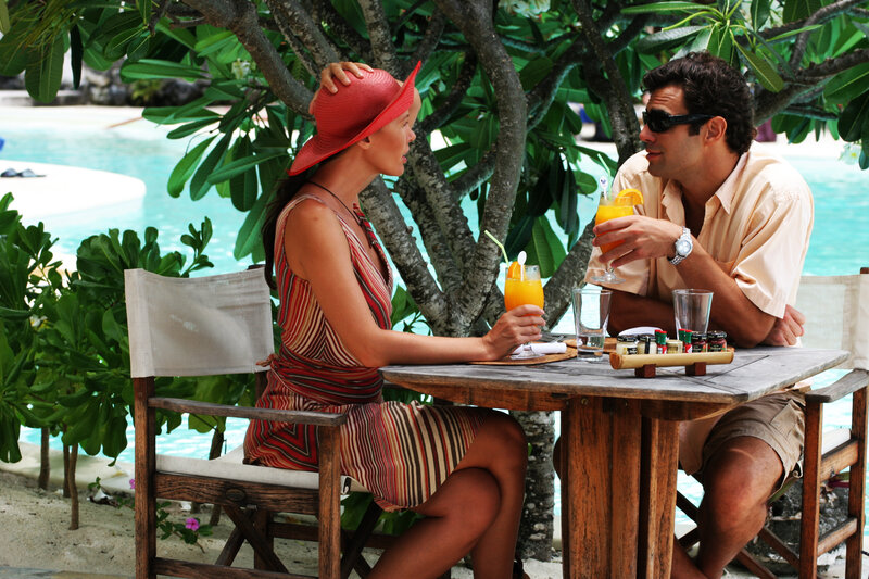 Couple at Poolside Table