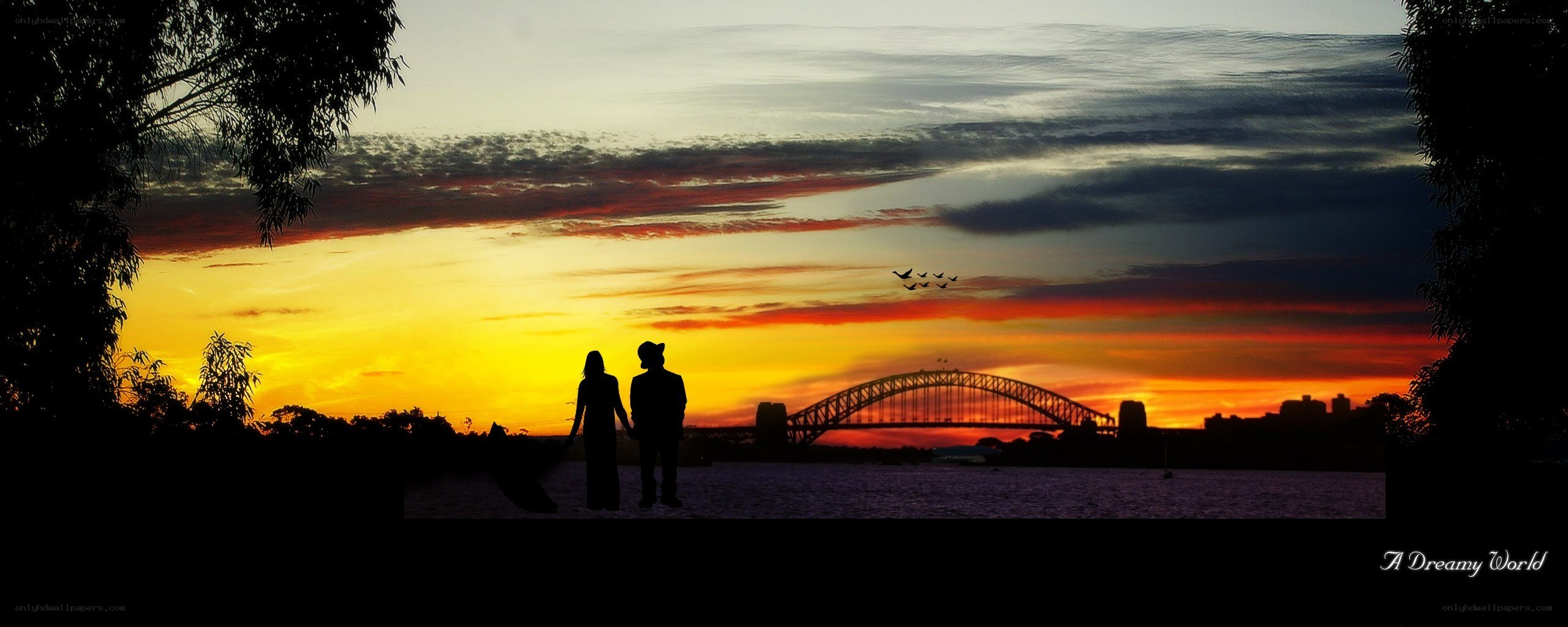 Couple at sunset by the bridge