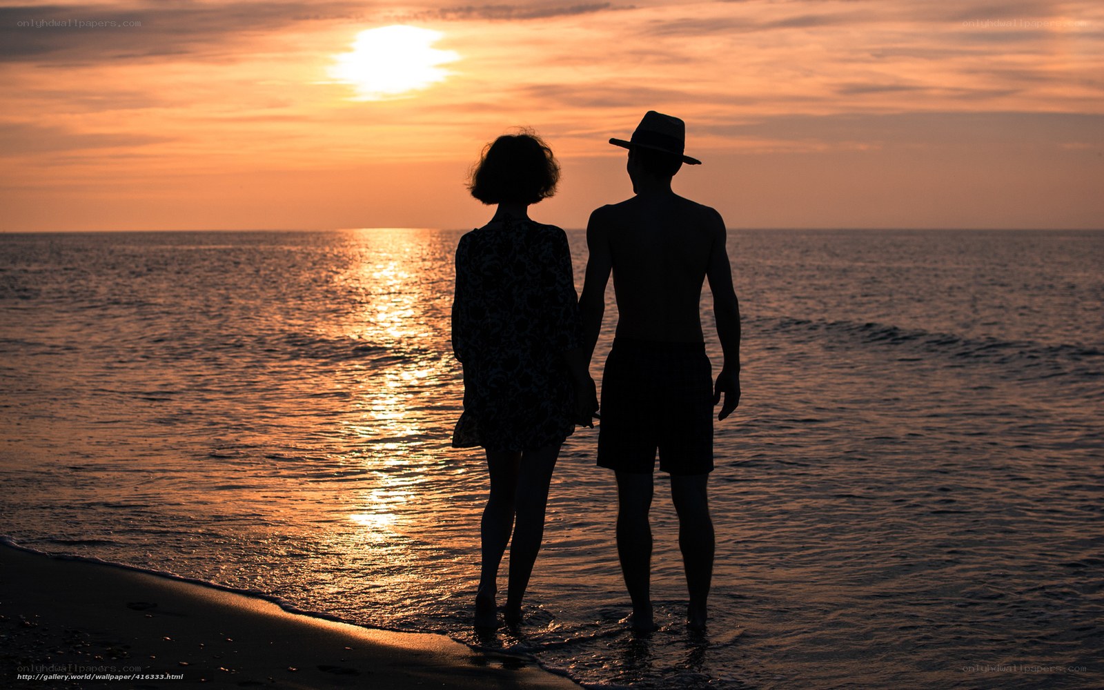 Couple at sunset on beach