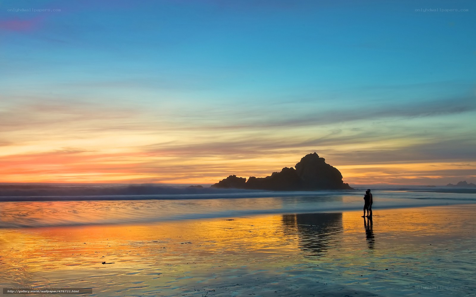 Couple at sunset on beach