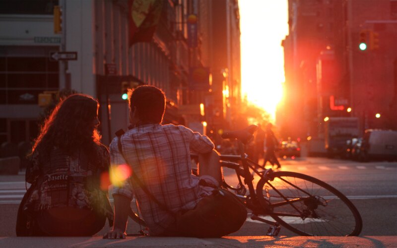 Couple at sunset on city street