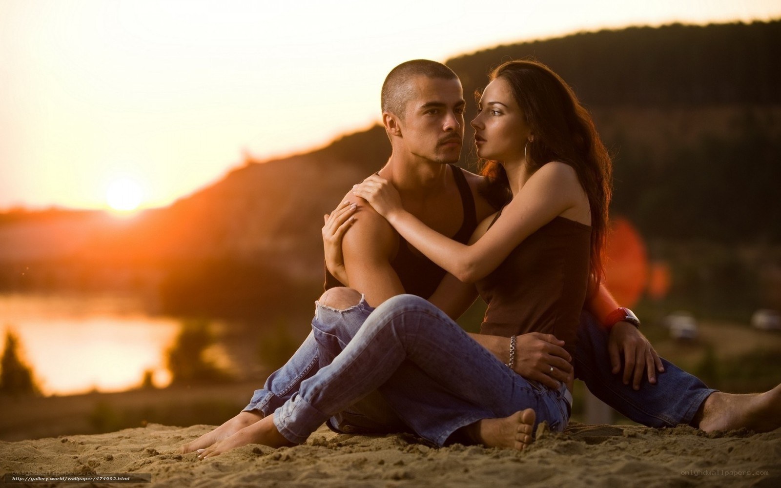 Couple at sunset on sand