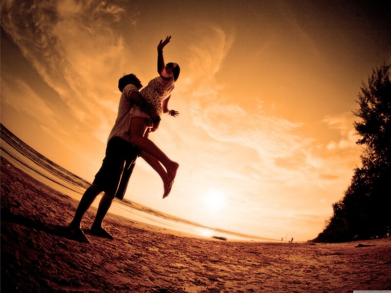 Couple at sunset on the beach