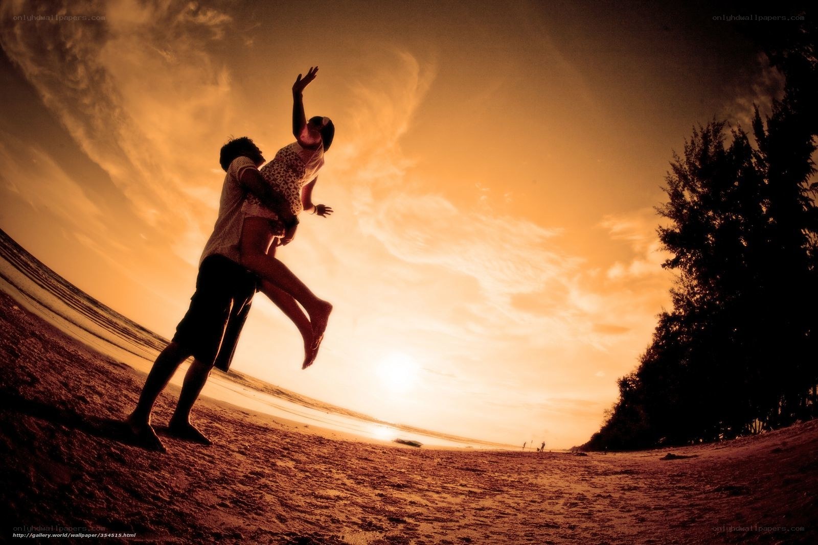 Couple at sunset on the beach