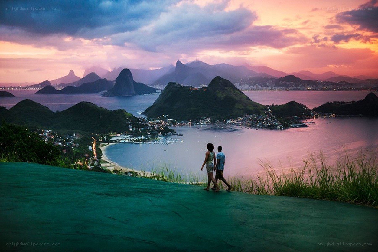 Couple at sunset overlooking Rio