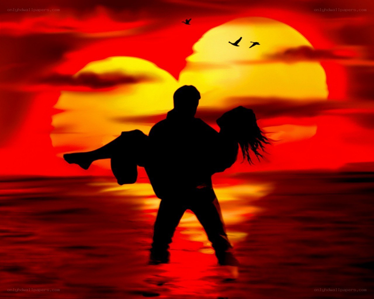 Couple at sunset silhouette