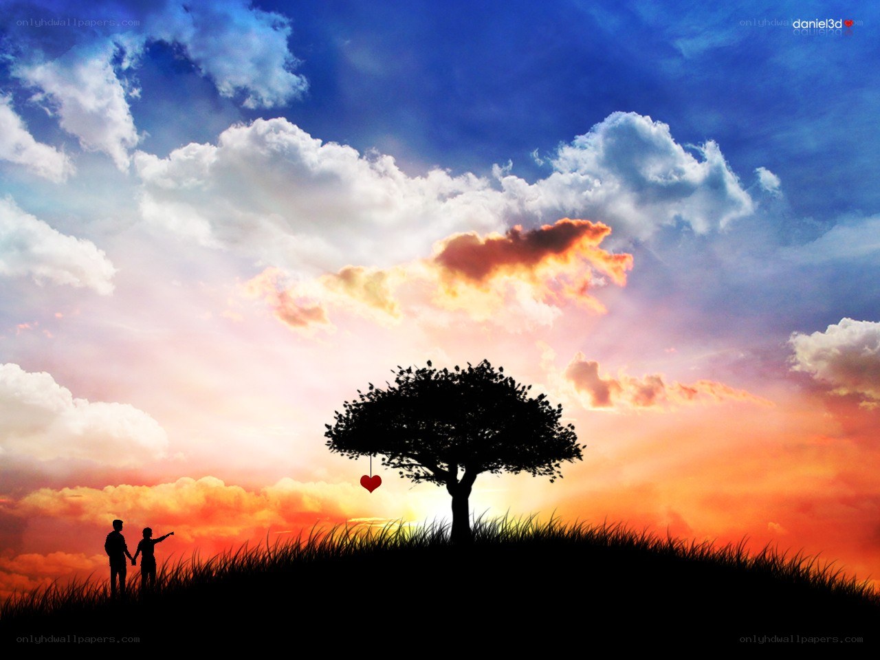 Couple at sunset with heart tree