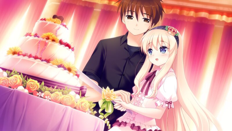 Couple at wedding cake