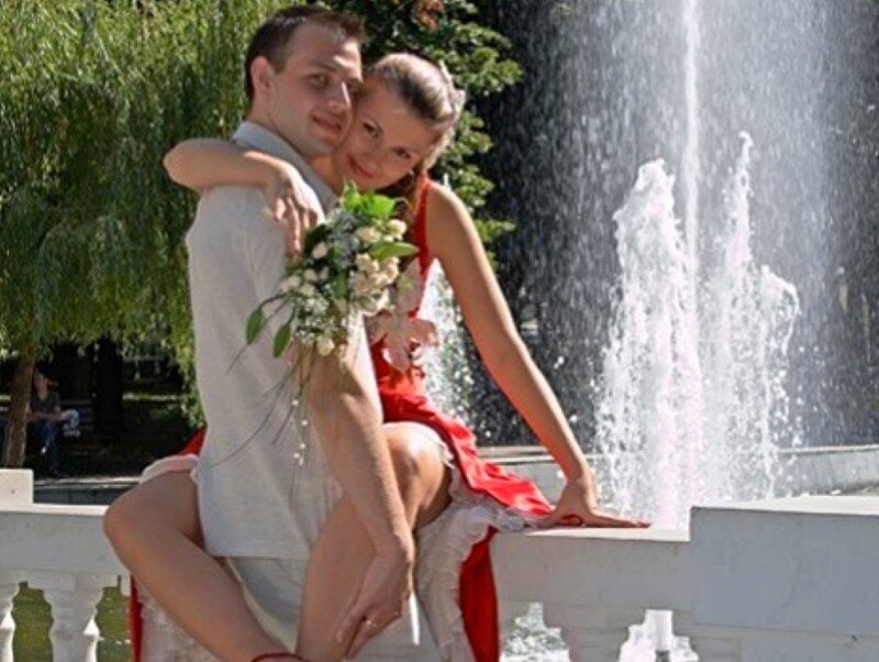 Couple by a fountain