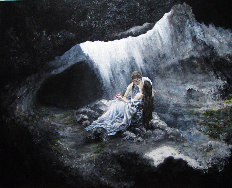 Couple by a waterfall cave