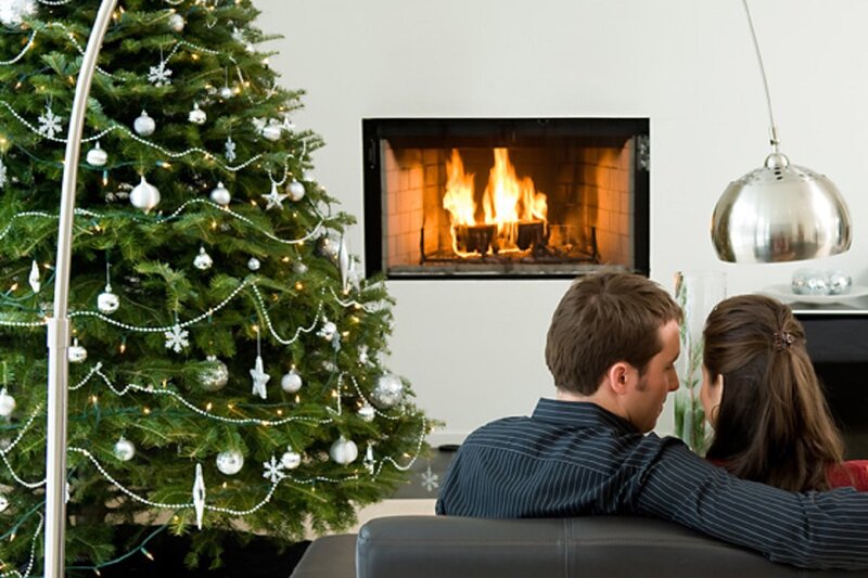 Couple by Fireplace