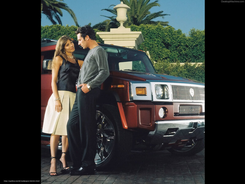 Couple by luxury SUV