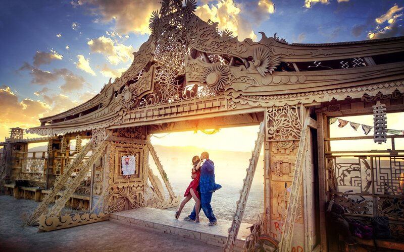 Couple dancing at sunset
