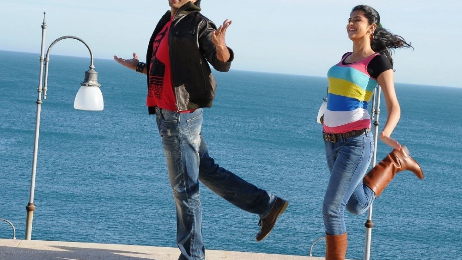 Couple dancing by the sea