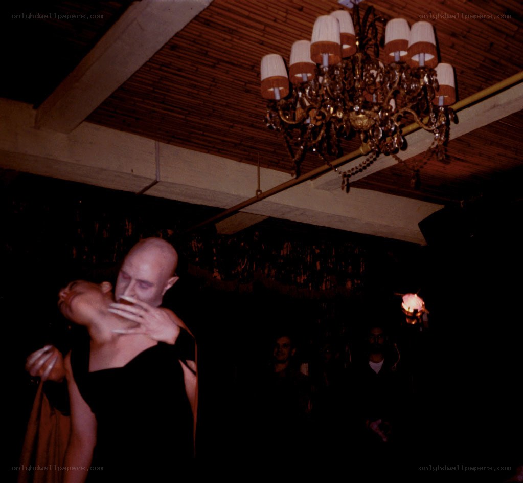 Couple dancing in dimly lit room