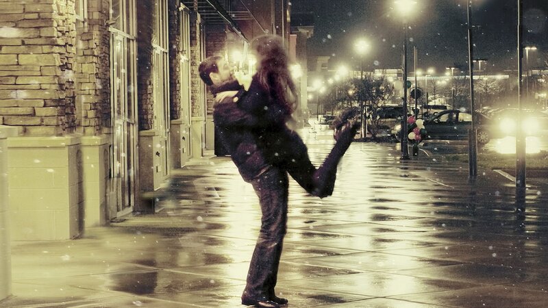 Couple dancing in the snow