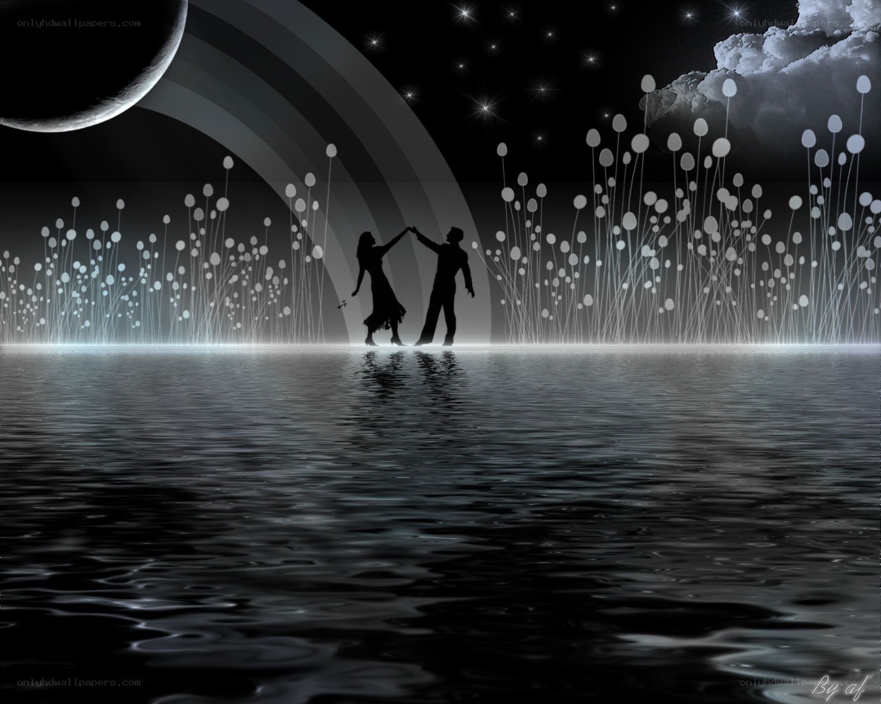 Couple dancing on a moonlit shore