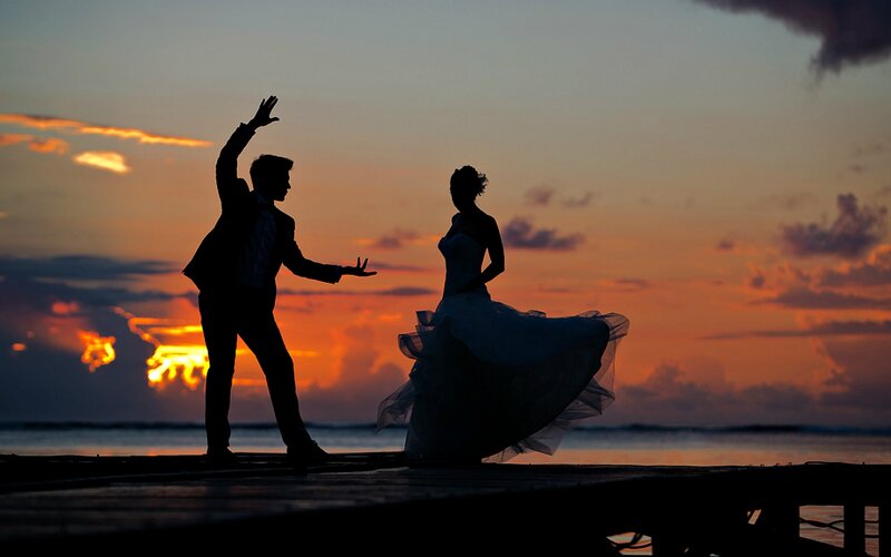 Couple Dancing on Pier