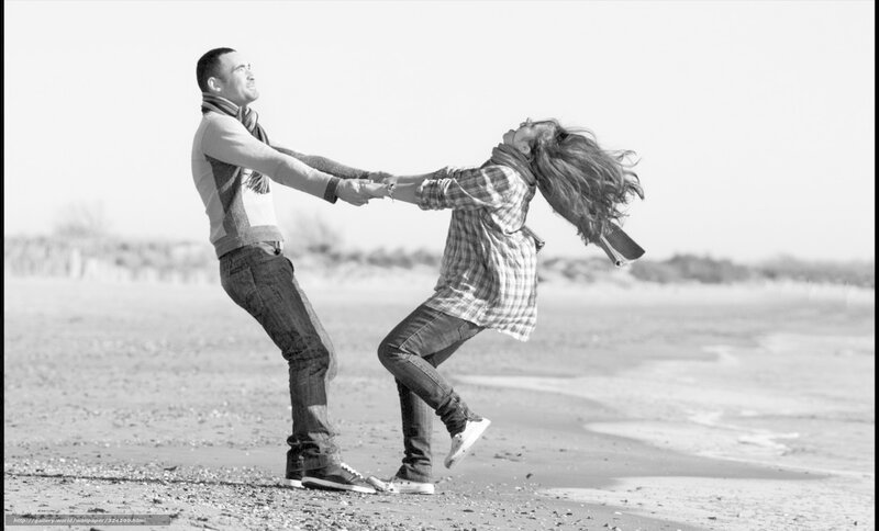 Couple dancing on the beach