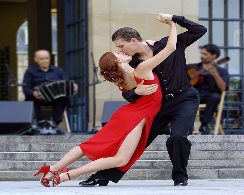 Couple dancing tango outdoors