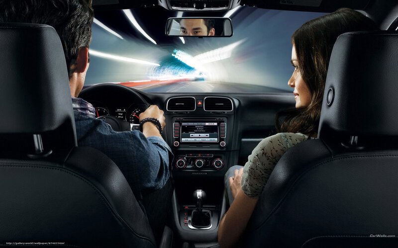 Couple driving in a car