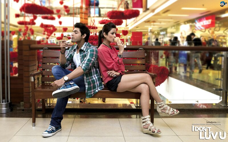 Couple eating ice cream in mall