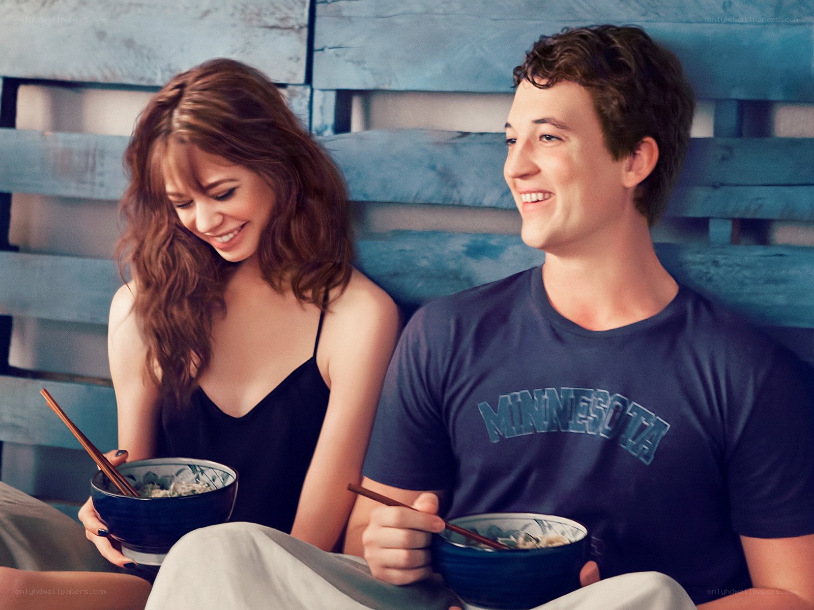 Couple eating noodles together