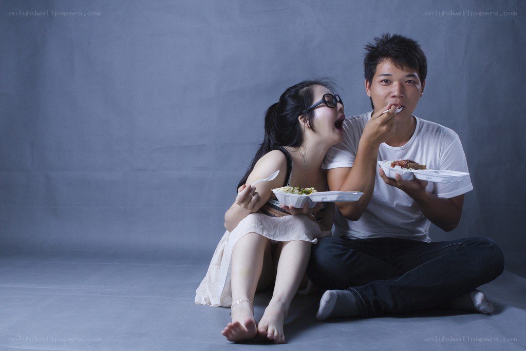 Couple eating takeout together