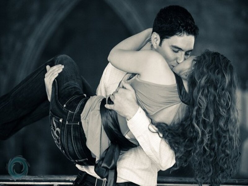 Couple Embracing and Kissing — Black