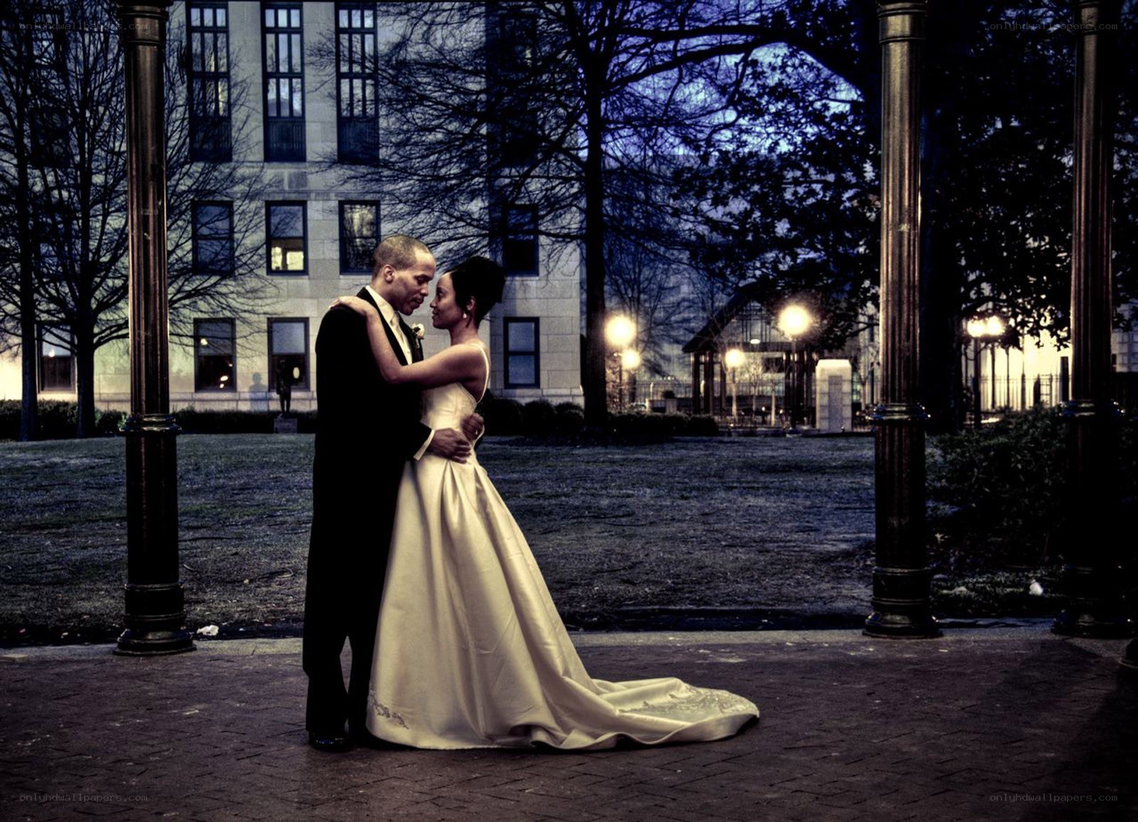 Couple embracing at dusk